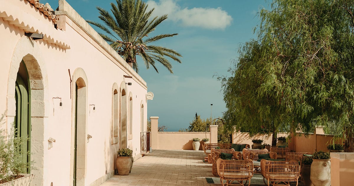 The historic stone baglio courtyard at Braccialieri Resort