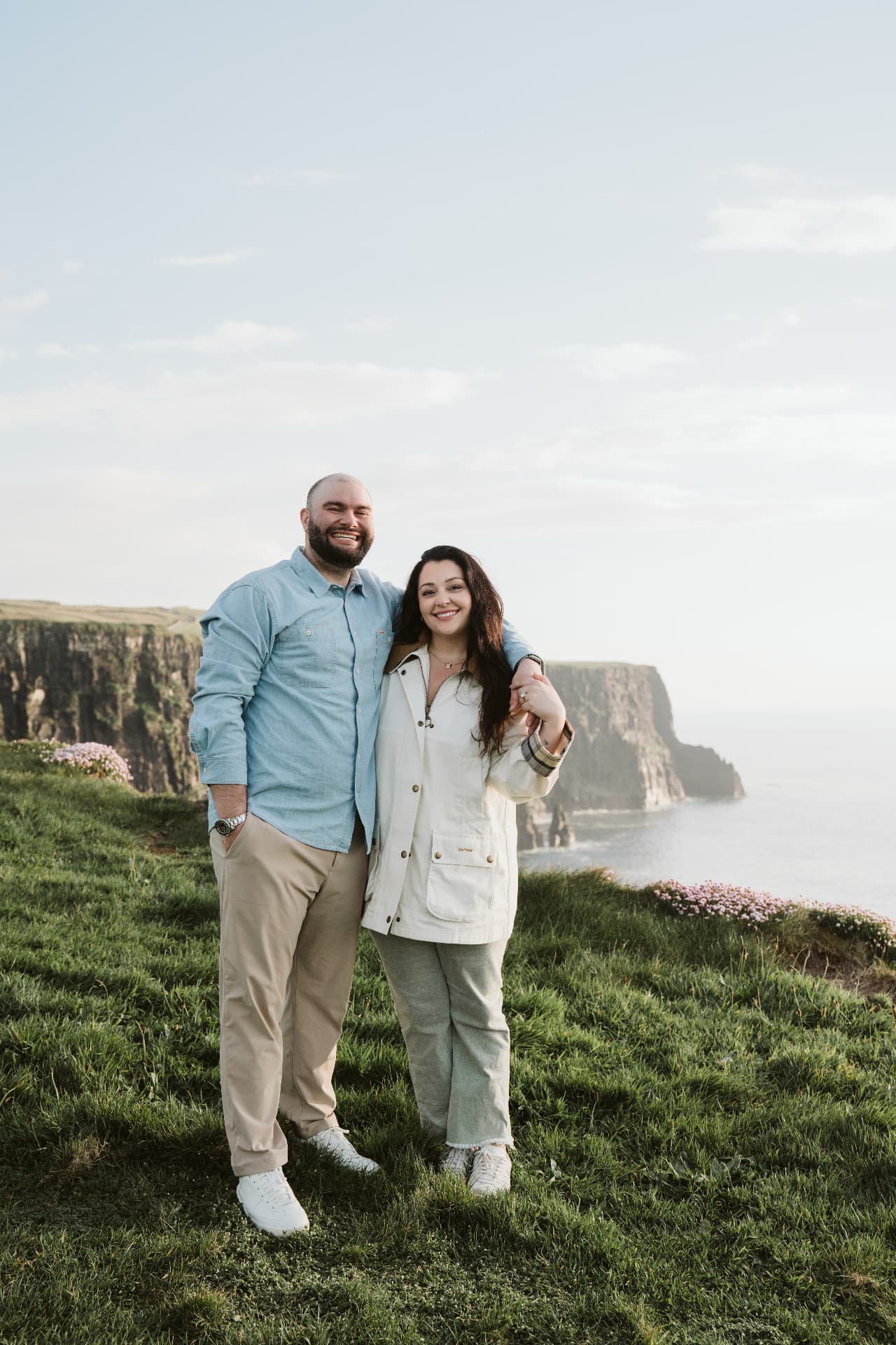 Jaime and Nolan on the Cliffs of Moher at golden hour